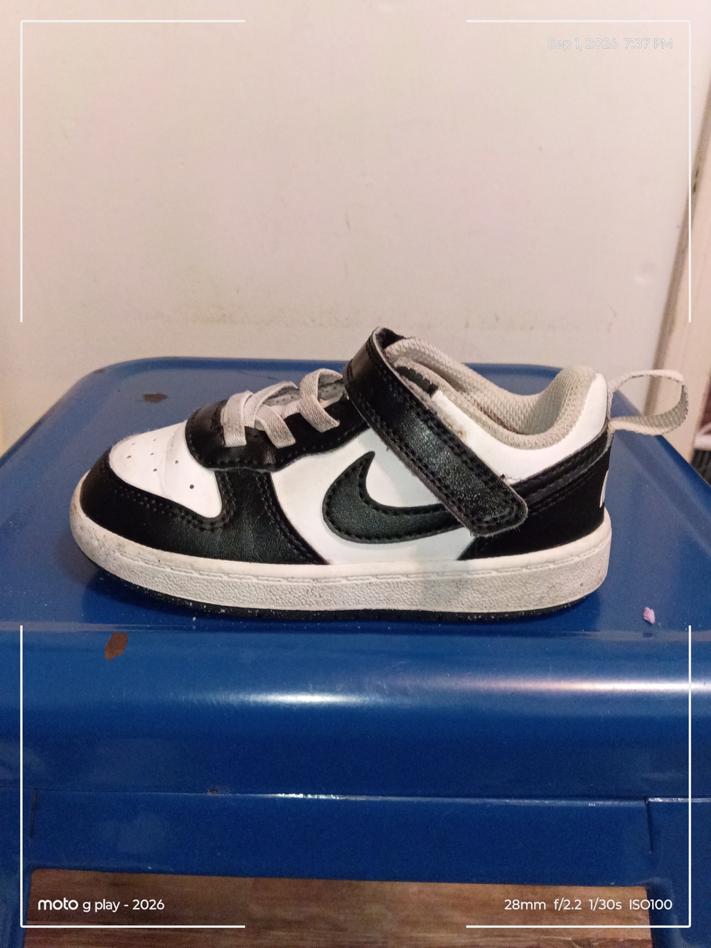 Nike Kids Black and White Low-Top Sneaker with Velcro Strap